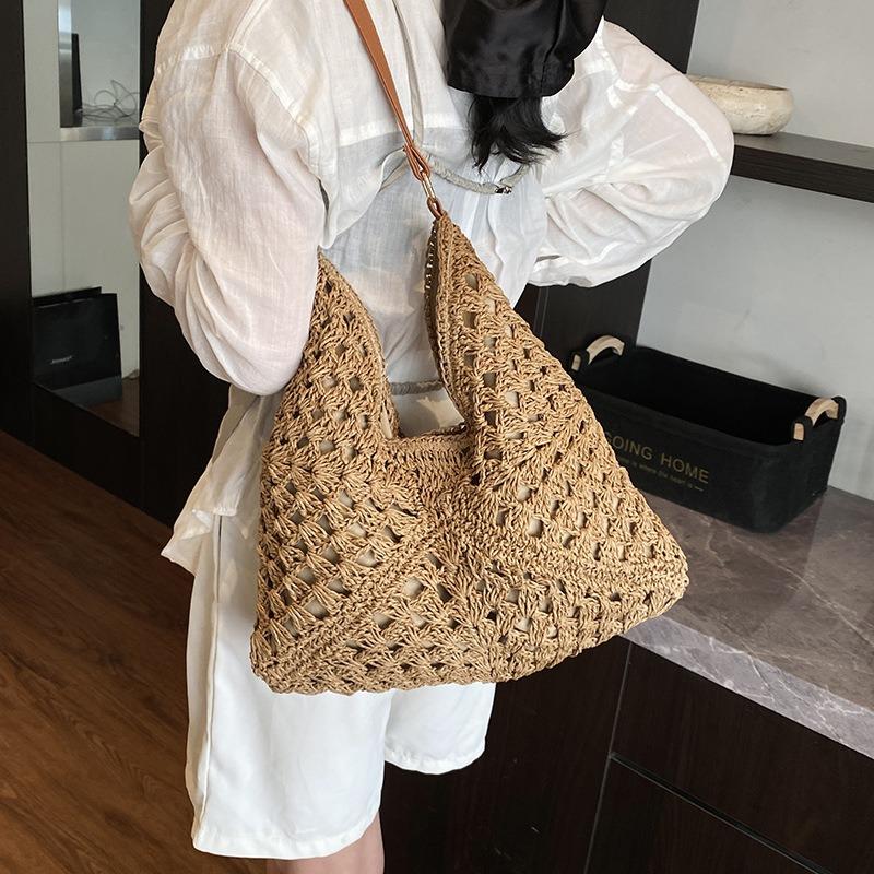Summer straw woven bag women's new seaside vacation beach hollow shoulder tote bag woven bag