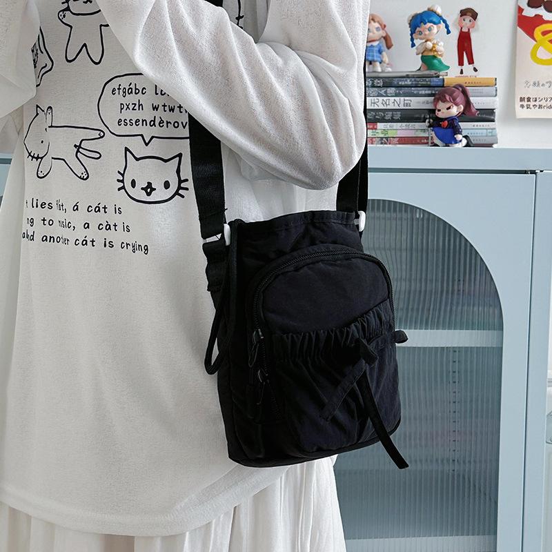 New outdoor lightweight bow bundle messenger bag waterproof mobile phone bag thermal insulation kettle bag women's shoulder bag