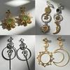 Manchettes d'oreilles gothiques vintage Soleil Lune Étoile Non percées Asymétriques Rétro Cosmiques Pendantes Clips d'oreilles pour Femmes Bijoux de Niche Exotiques