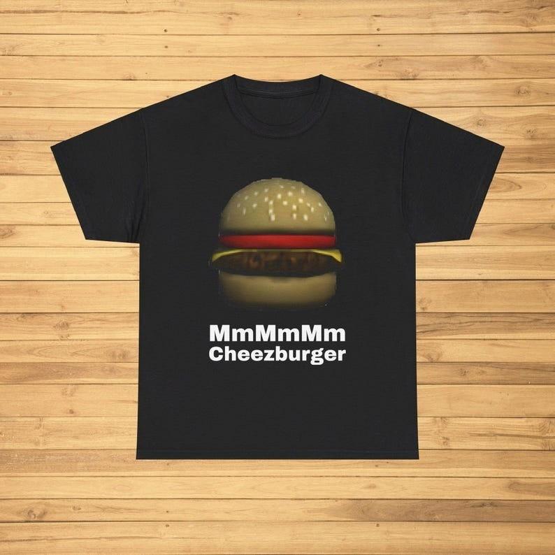 

MmMmMm Cheezburger Funny Meme T-Shirt Joke Tee Gift Shirt Trending Shirt Unisex T-Shirt XXXL