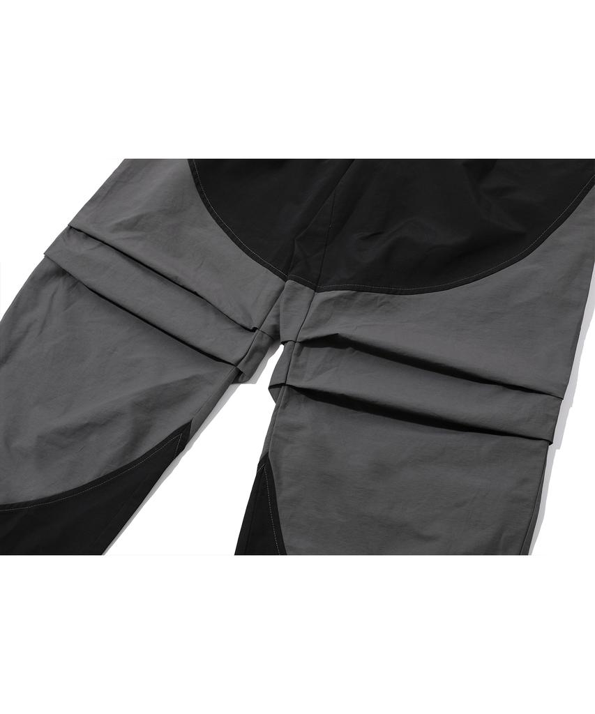 CPGN STUDIO Round Cut Dart Nylon Pants Black