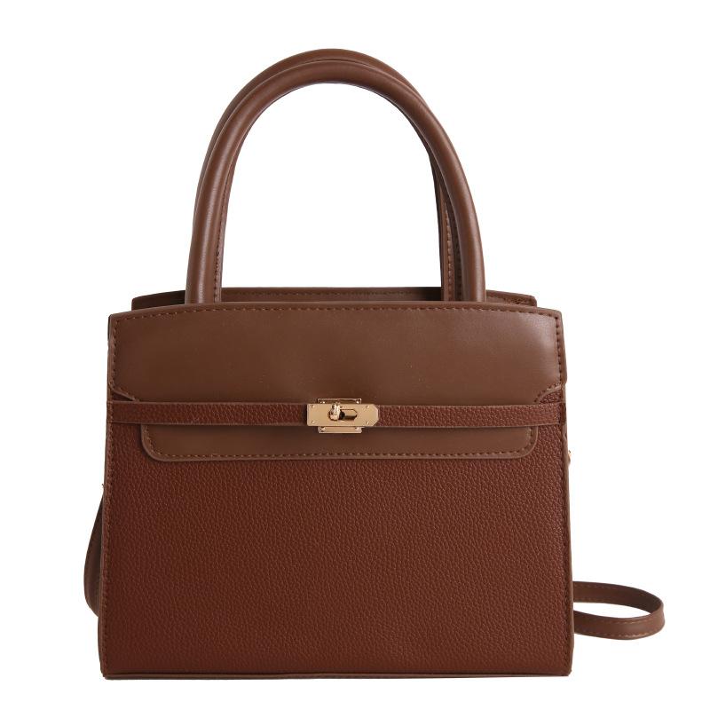 Bolsos de mujer extranjeros, elegantes y sencillos, portátiles, bandoleras cruzadas casuales de gran capacidad, versátiles, bolsos de empalme de contraste de color de alta gama