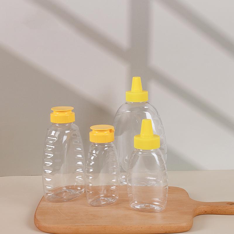 Transparent Reusable Plastic Honey Bottles Squeeze Honey Bottle Container Holder With Lid For Storing And Dispensing Honey Jar