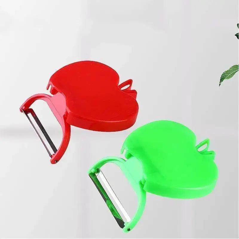 

Овощечистка в форме яблока, креативная складная, для картофеля, батата, яблок, пластиковая, из нержавеющей стали, портативный скребок, кухонный маленький инструмент Random color 2Pcs