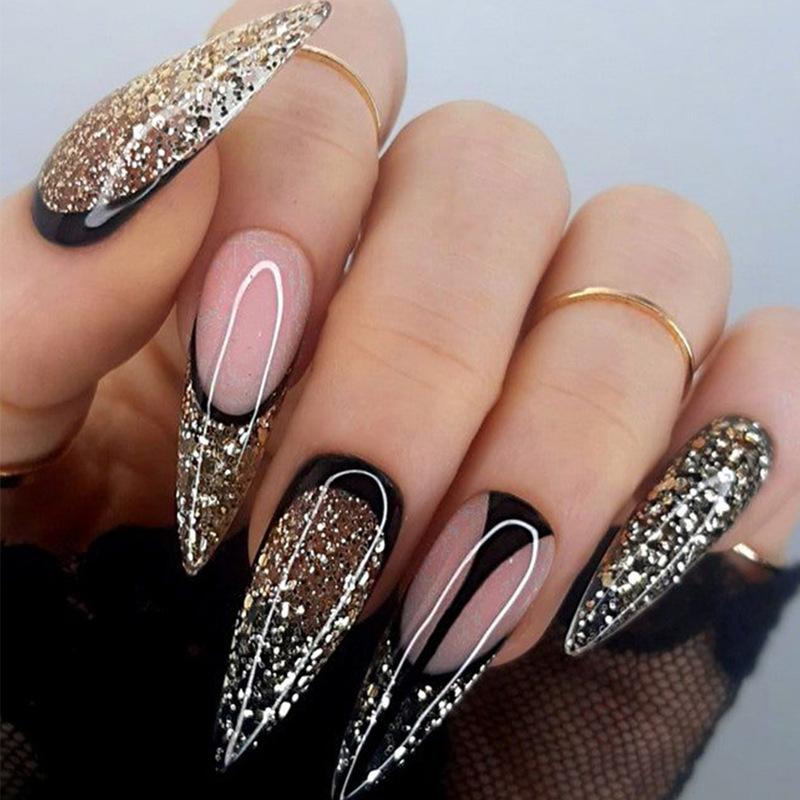 

Wearing A Medium Length Almond Nail Patch for Nail Enhancement, with A Burst of Dark Gold Glitter and French Pointed Nail Patches