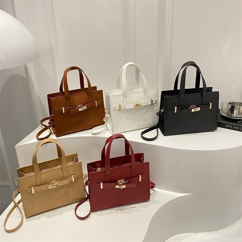 Stor kapacitet sommar vardaglig ny retro mode textur vardaglig bärbar tote crossbody axelväska kvinnor