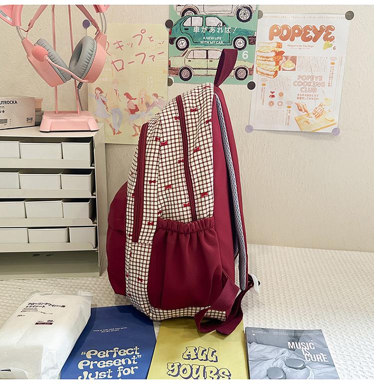 Słodki plecak w stylu japońskim z kokardą: Lekka, wodoodporna torba na ramię dla uczniów szkół średnich i ponadgimnazjalnych.