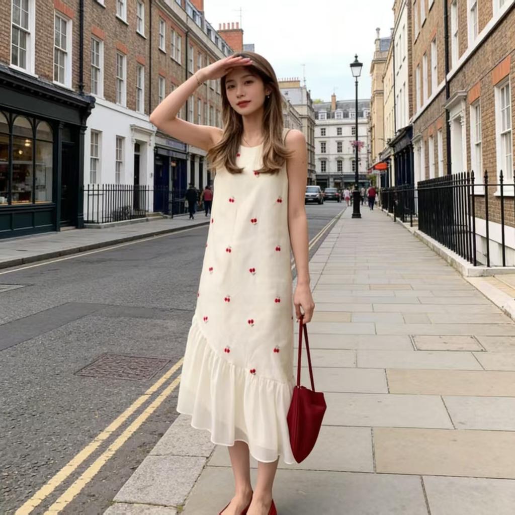 French small sleeveless suspender vest skirt women's 2026 summer new seaside vacation ruffle leaf edge dress