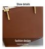 2024 Spring Women's Minimalist Crossbody Shoulder Bag - High-Quality, Fashionable, Versatile Handbag with Unique Stitching.