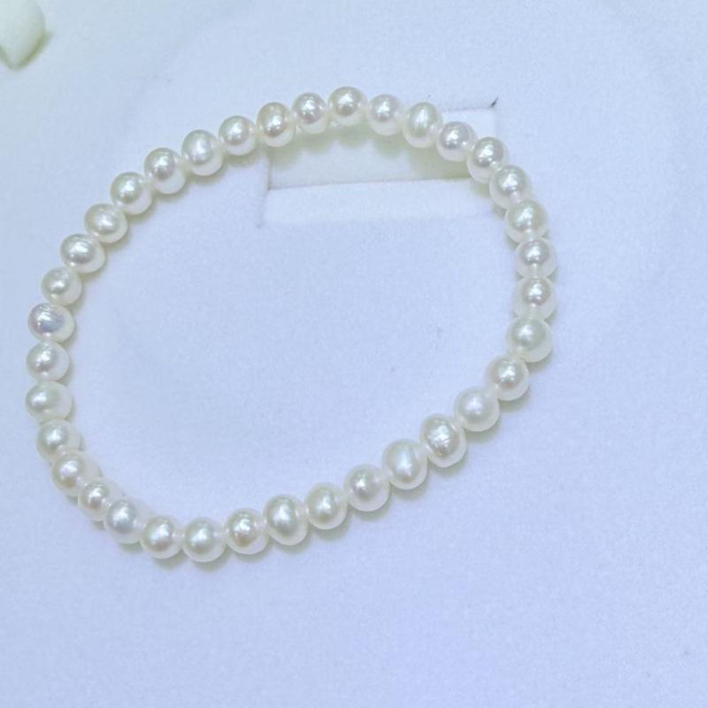 Zhuji Freshwater Pearl Bracelet: 4.5-5mm Near Round Pearls on a Durable Leather Cord