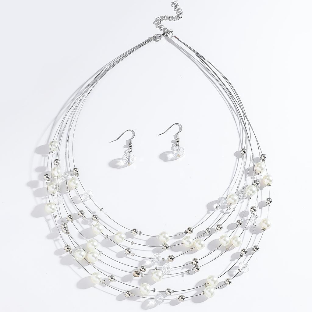 Ensemble bohème rétro pour femme : collier et boucles d'oreilles à plusieurs rangs de cristaux turquoise, style bohème exagéré.