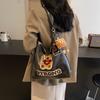 Fashion and leisure large-capacity backpack women's 2025 new spring and summer cartoon embroidery high-end niche design