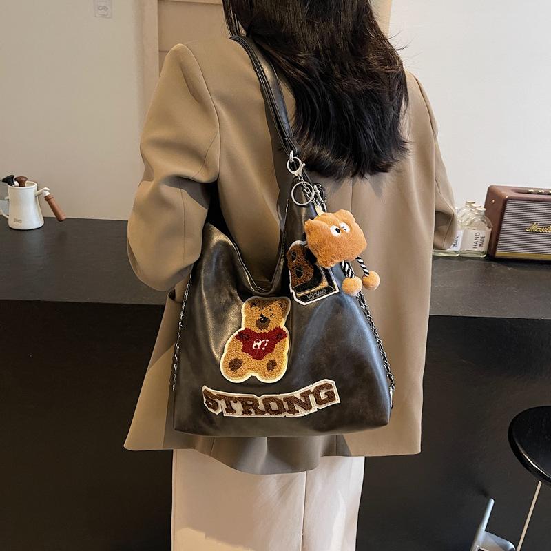 Fashion and leisure large-capacity backpack women's 2025 new spring and summer cartoon embroidery high-end niche design