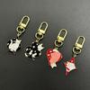 Cartoon Cat Playing Card Keychain with Heart and Geometric Pendant