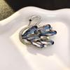 Elegant Rhinestone Animal Brooch: High-End Flower Design for Women's Coats and Accessories