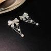 Non-Pierced Ear Cuffs: Elegant French Pearl Chain Studs with a Luxurious High-Design Flair