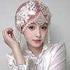 Elegant Hand-Beaded Tassel Beanie with Lace Flowers