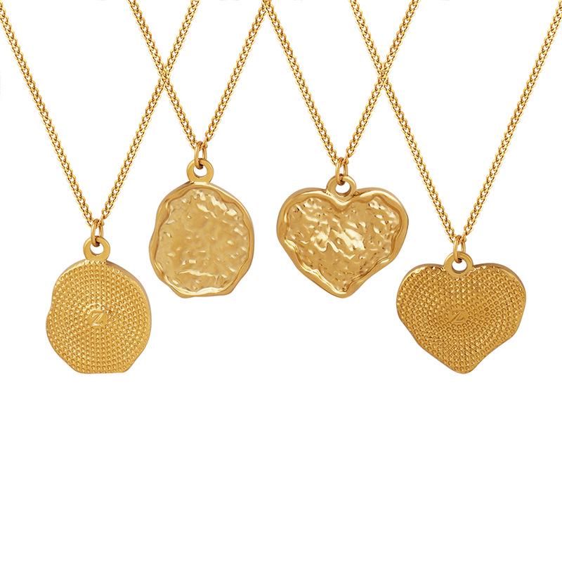 Gold-Plated Titanium Steel Heart Pendant Necklace with Embossed Design - European/American Style