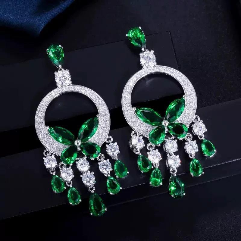 Silver Needle Diamond Inlaid Butterfly Tassel Earrings and Necklace Set: Elegant Hollow Design with Personality and Style.