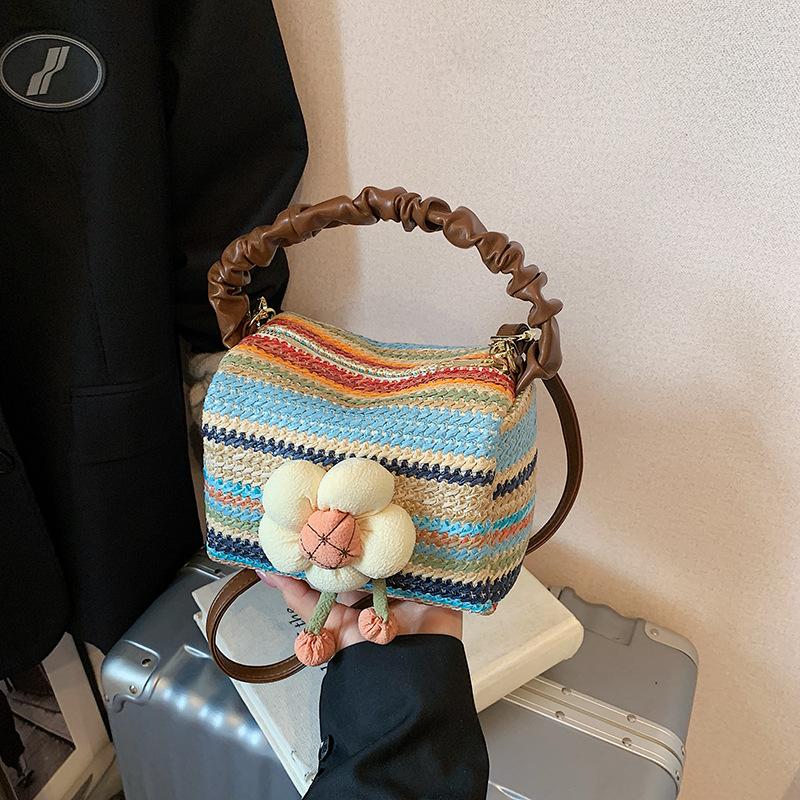 

Niche design woven straw bag women s summer new pillow bag seaside vacation beach bag разноцветный