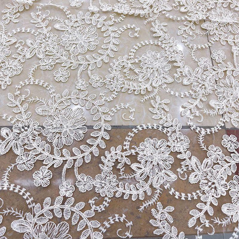 Embroidered Lace Fabric with Flower-like Patterns Suitable for Wedding Dresses Formal Gowns and Designer Clothing Fabrics