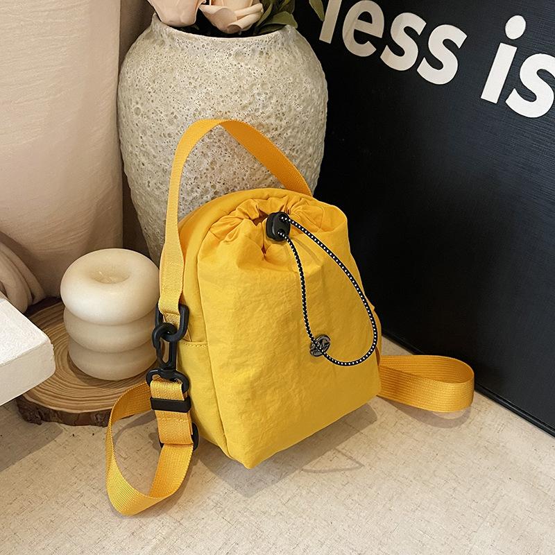 Kettle bag waterproof casual shoulder bag women's tide brand versatile mobile phone bag fitness walking messenger bag water cup cloth bag men