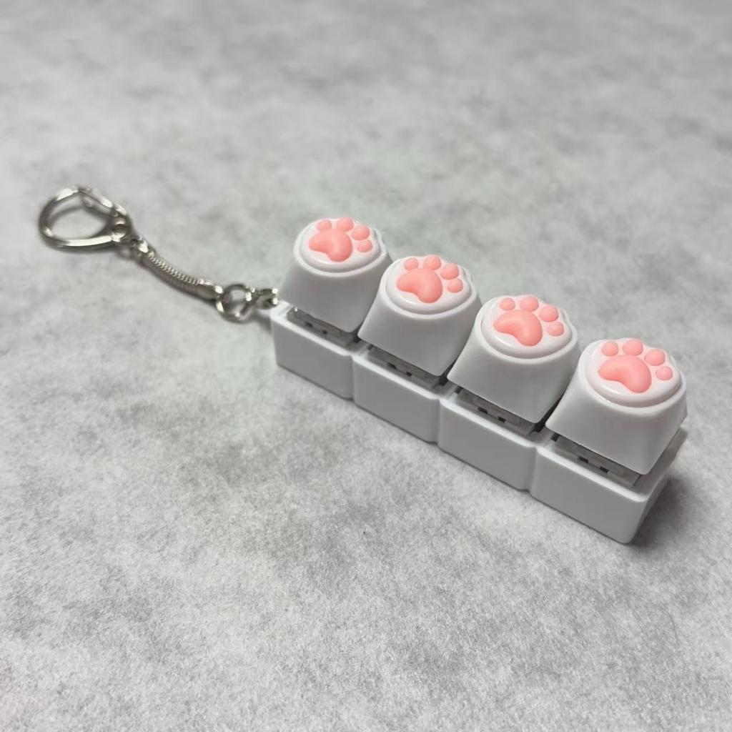 Katzenpfoten-Schlüsselanhänger / 4-Tasten-Klicker-Stressabbau-Spielzeug / Niedlicher Mini-Tastatur-Schalter-Schlüsselanhänger / Tragbares Entspannungsspielzeug / Taschenanhänger