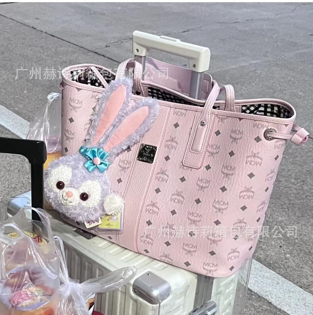 Neue MC-bedruckte Mutter-Kind-tragbare Tote-Schultertasche große Kapazität Messenger-Tasche Mode vielseitig Unterarm-Pendler-Damentasche
