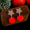 Festliche Schneeflocken-Ohrringe mit eingelegten Diamanten & Pompon-Anhänger