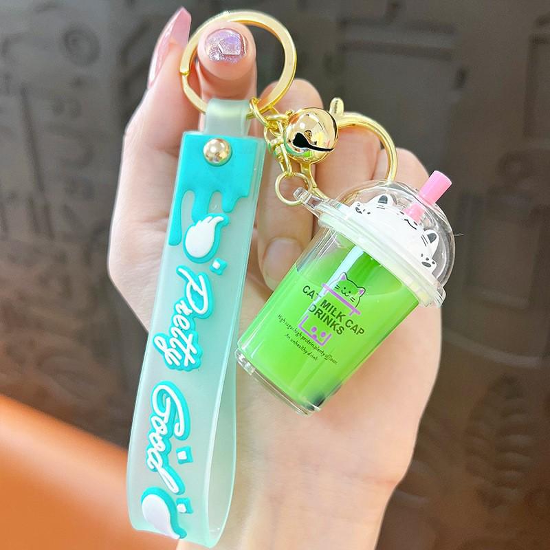 Exquisite Quicksand Panda Keychain: Cartoon Oil-Filled Doll Bag Pendant and Car Accessory