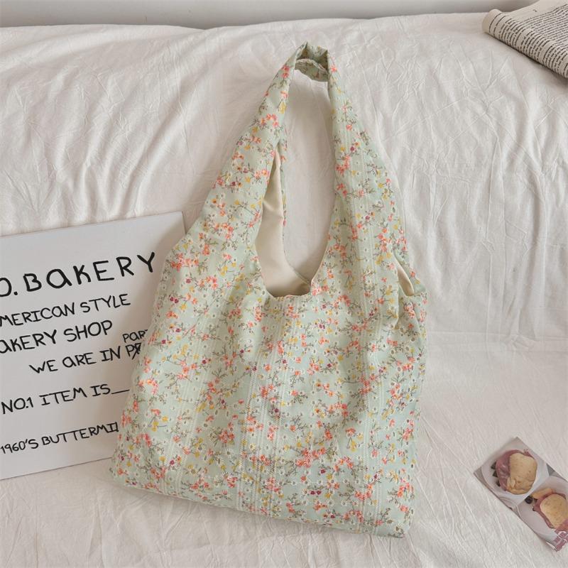 Korean Niche Hollow Broken Flower Canvas Bag Women's New Largecapacity Commuter Underarm Bag Shoulder Bag