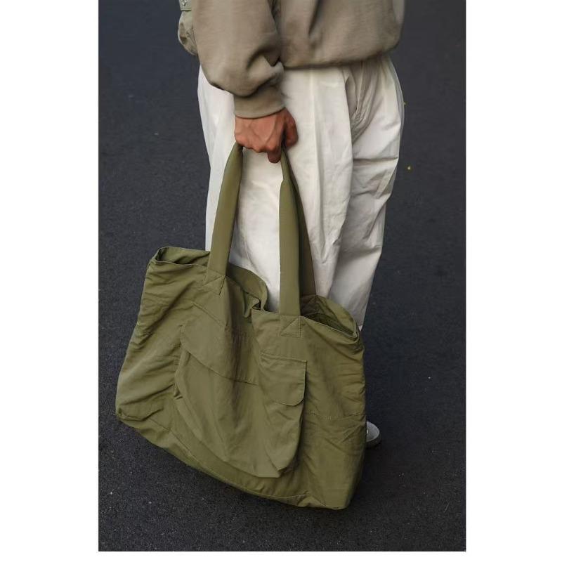 

Spring and Autumn original simple shoulder tote bag, water-proof, light, portable and large-capacity storage commuter bag height 38 width 50 length 5