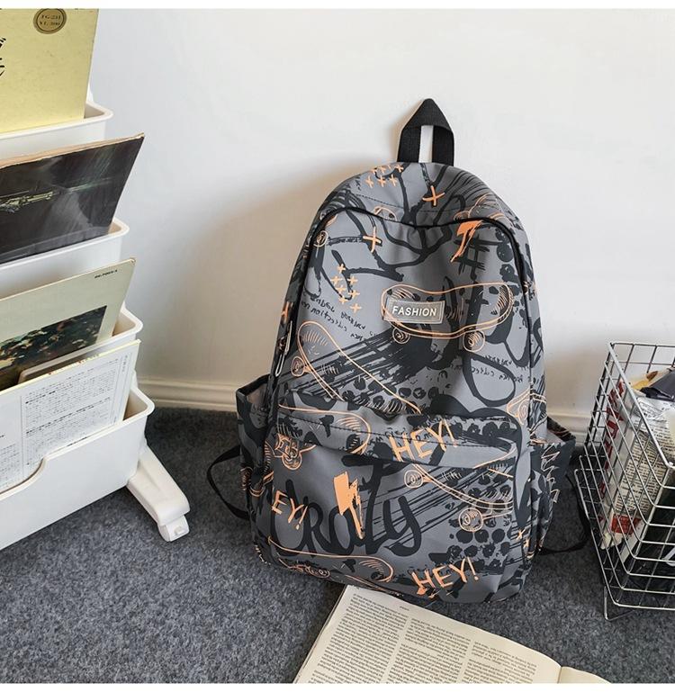 

Шкільний рюкзак учня середньої школи великої ємності, повсякденний модний учень молодшого класу, корейська версія рюкзака для подорожей студента коледжу помаранчевий