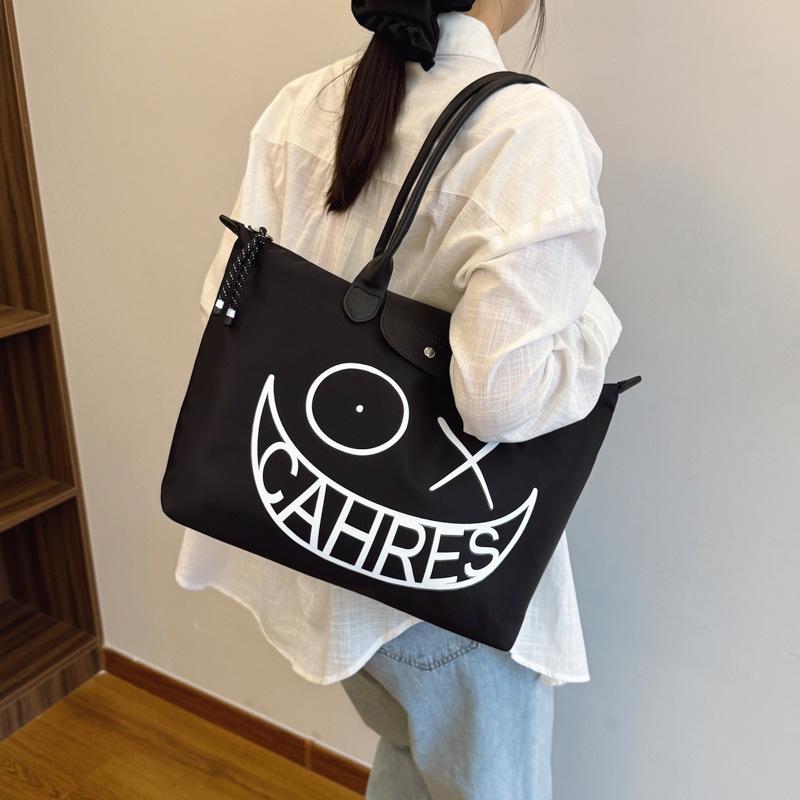 Large capacity bag women's new high-end sense niche portable shoulder bag fashion messenger tote bag tide