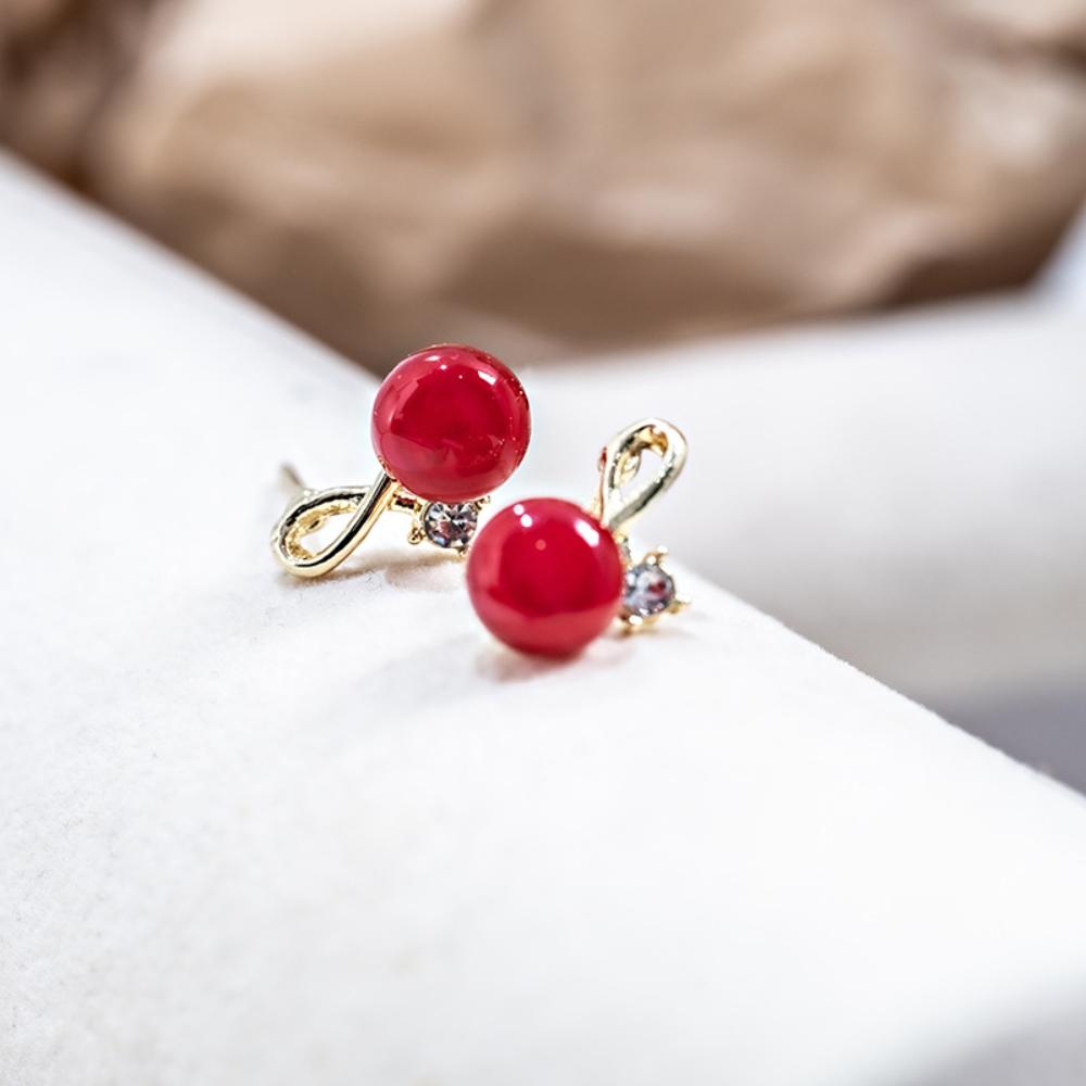 

Серьги из бобов красной акации красный