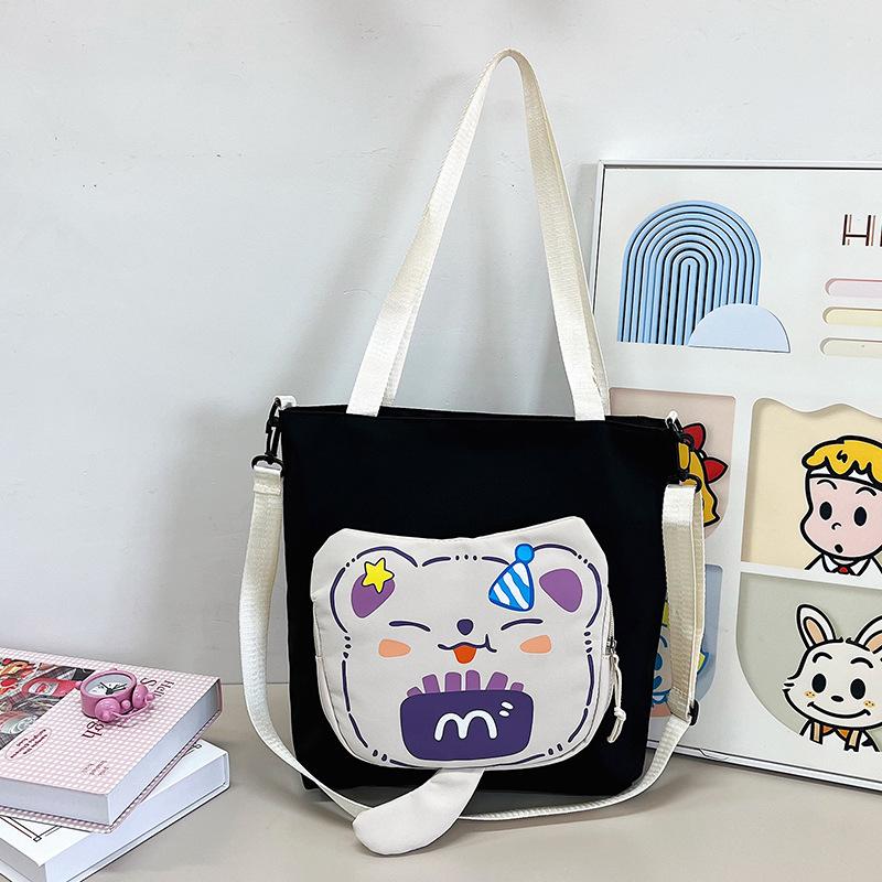 

Мультяшная универсальная сумка-мессенджер для девочки, большая вместительная сумка-тоут через плечо, модная сумка-тоут для занятий для студентки one size fits all чёрный