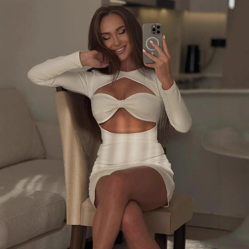 Autumn and Winter Women's Fashion Sexy Hollow Round Neck Long Sleeve Slit Spice Girl Dress