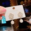 Fashion Geometric Bow Flower Pearl Earrings Women'S Premium Versatile Small Fragrant Wind Earrings