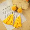 Bohemian retro pom-pom fringed earrings women's vacation long temperament niche personality earrings