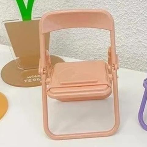 

1 Pcs Creative Folding Chair Universal Desktop Mobile Phone Holder Mini Folding Stool Desk Decoration Gift Accessories рожевий