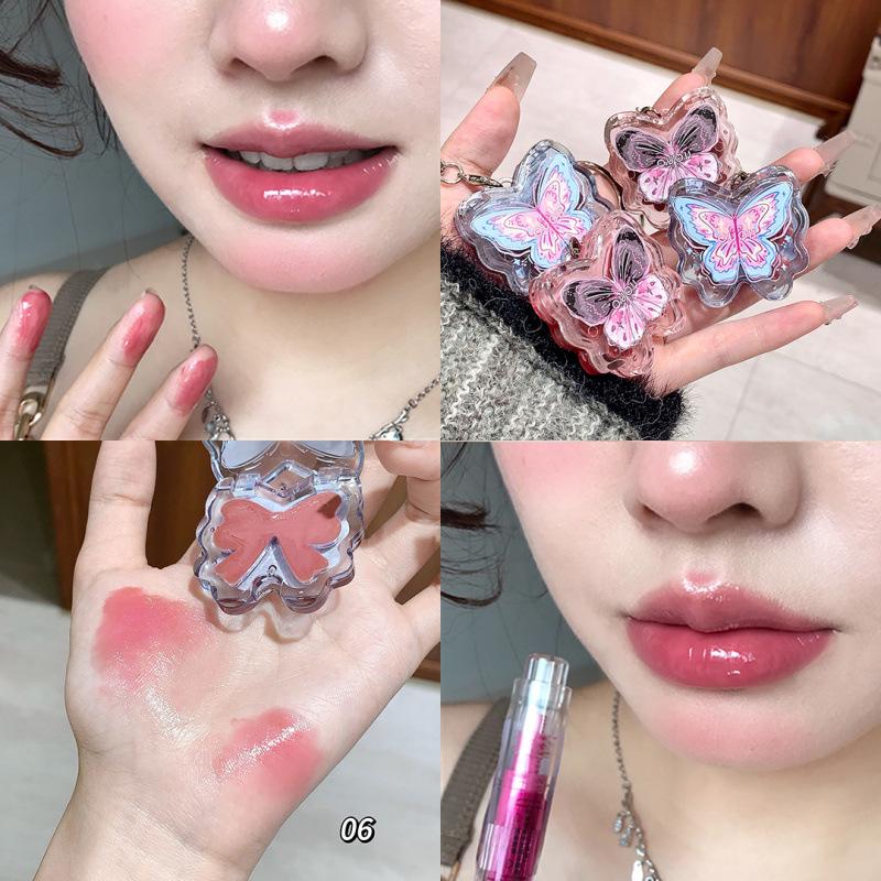 OUOII Luminous Butterfly Wing Lip Tint: Glossy, Plump, Long-Lasting, and Moisturizing Lip Gloss with Subtle Color.