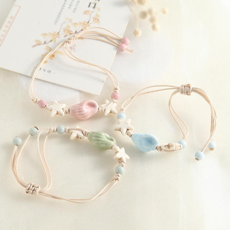 Jingdezhen Keramik Perlenarmband - Handgewebtes Porzellan mit Muschelakzenten