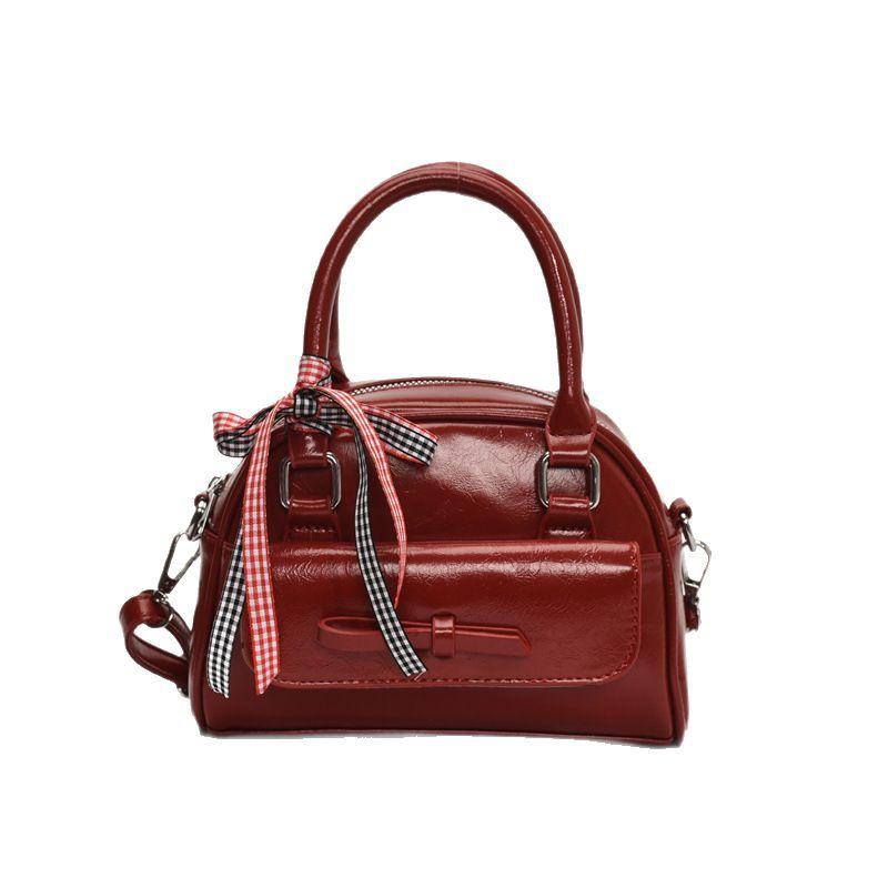 South Korea's Popular Simple Niche Portable Bow Bowling Bag 2025 New Niche Design Casual Messenger Bag