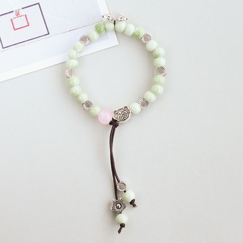 

Китайская кисточка Цзиндэчжэнь керамика тканый ремешок-бабочка Bean Green