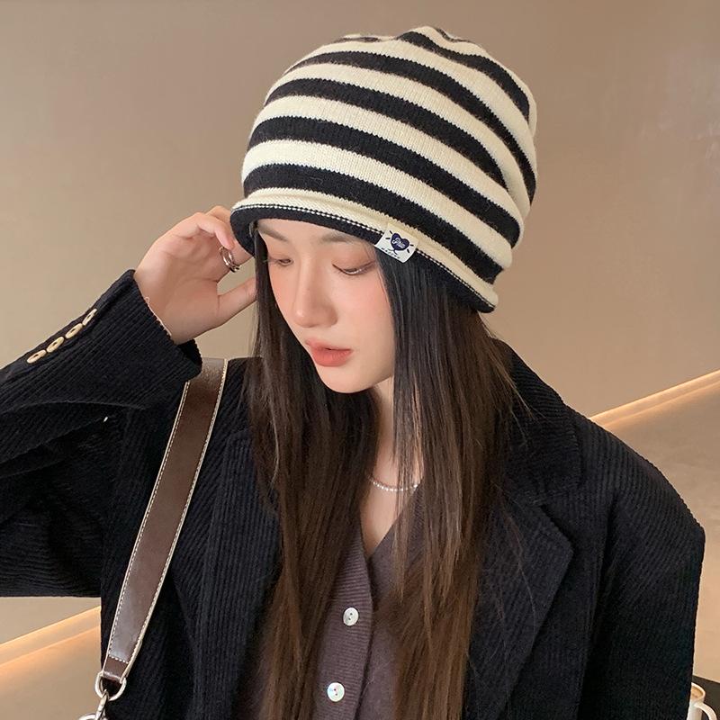 Wool Knitted Hat Cold Hat  Two color Patchwork Rolled Edge High End Pile Hat for Women European and American Ear Protection Cap Showing A Small Face