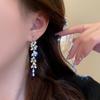 High-End Leaf Design Rhinestone Tassel Earrings for Women - Unique, Luxurious, Niche Dangle Studs.