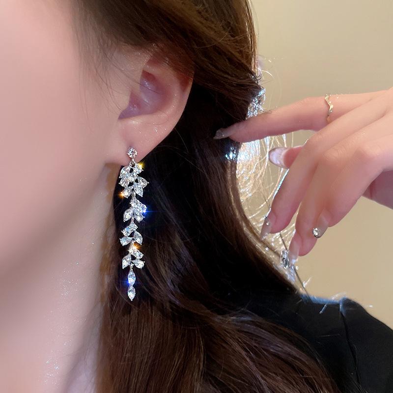 High-End Leaf Design Rhinestone Tassel Earrings for Women - Unique, Luxurious, Niche Dangle Studs.