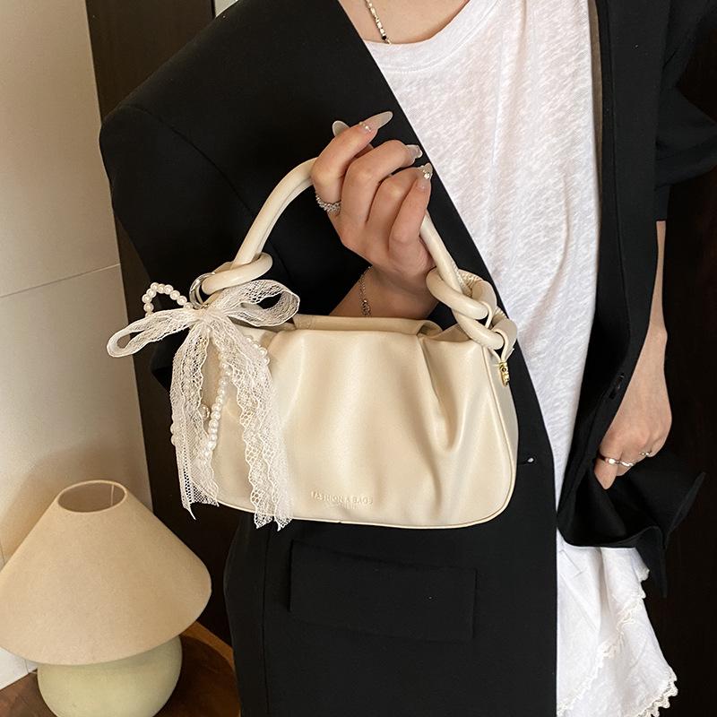 High-end Niche Bag Women's 2025 New Summer Versatile Messenger Bag Fashionable Portable Pleated Bucket Bag