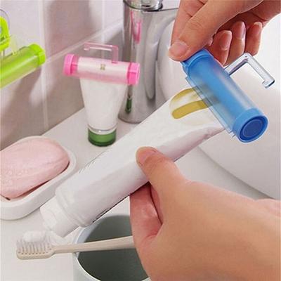Useful Plastic Rolling Tube Squeezer Toothpaste Easy Dispenser Bathroom Holder