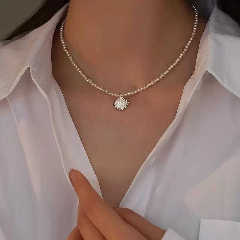 Elegant temperament shell pearl necklace women's versatile exquisite gentle wind millet bead collarbone chain neck chain new accessories